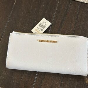 NWT MK Jet set Travel Wallet